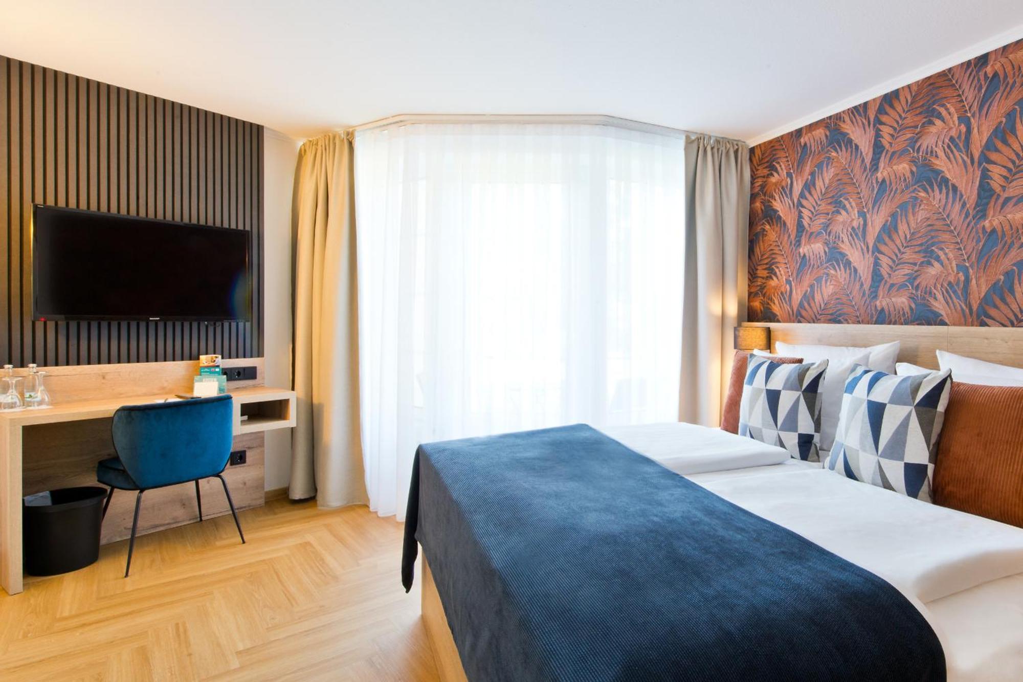 Atrium Hotel Amadeus Osterfeld Стая снимка